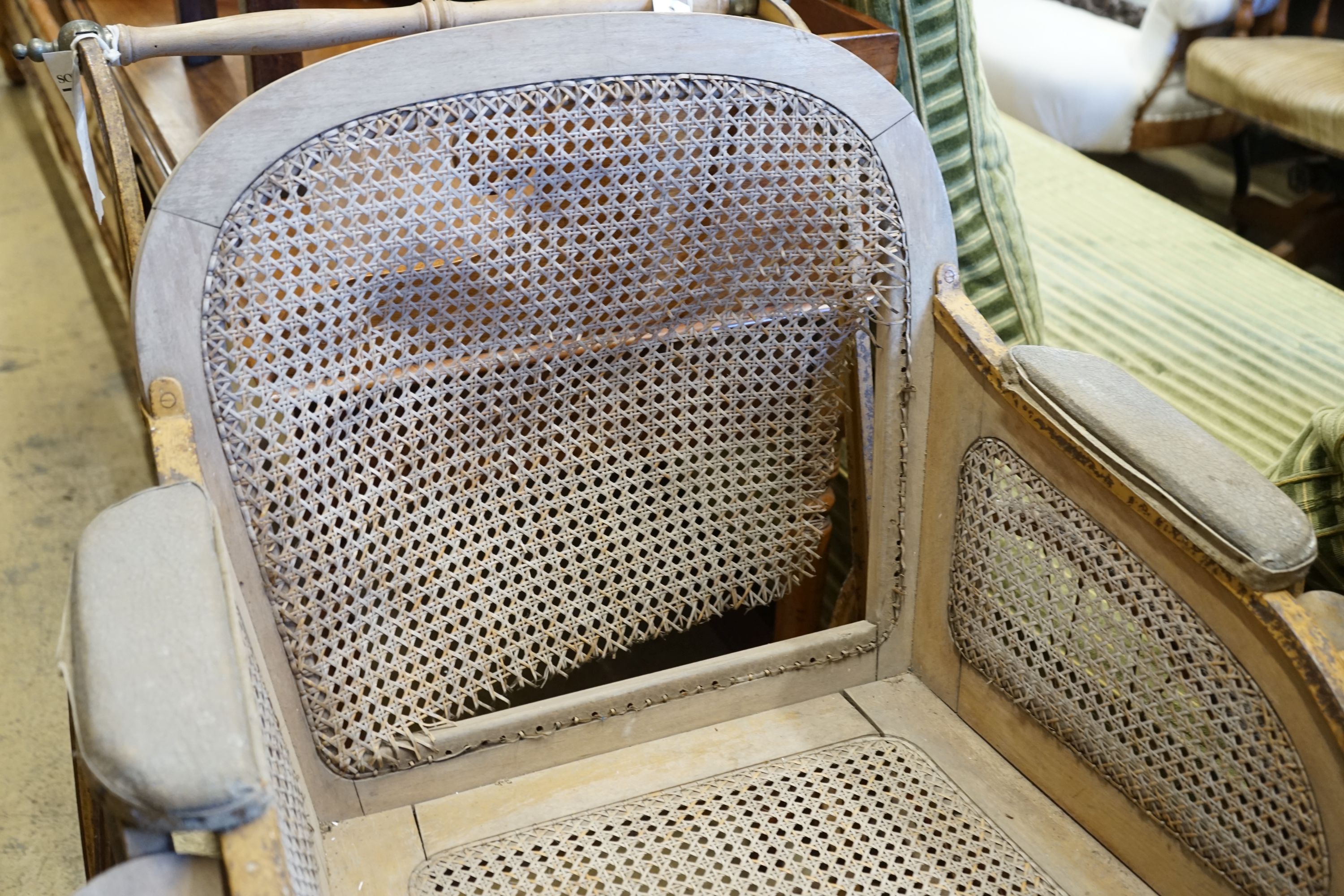 A late Victorian caned invalid chair
